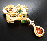 Брошь с зеленым апатитом авторской огранки 4,39 карата, спессартинами гранатами 5,47 карата, цаворитами гранатами 3,79 карата, разноцветными и бесцветными сапфирам