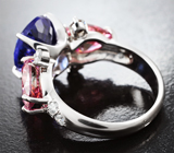 Кольцо с топовым танзанитом 6,46 карата, розовыми 3,92 карата и бесцветными муассанитами 0,6 карата Золото