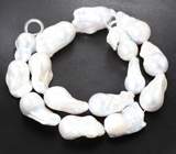 Набор из 15 крупных кремово-белых морских жемчужин на нити 498,12 карата