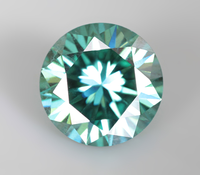 Кольцо с голубовато-зеленым муассанитом 1,3 карата и танзанитом 1,2 карата