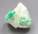 Кристаллы уральских демантоидов в породе 5,95 грамм Не указан