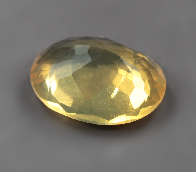Ограненный бразильский "солнечный" опал 1,28 карата