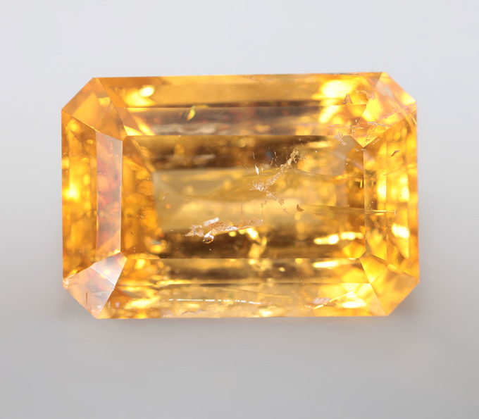 Кольцо с ярко-желтым топазом 5,81 карата и ограненным лунным камнем