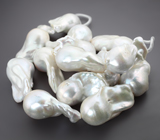 Массивный набор из 14 крупных кремово-белых морских жемчужин барокко на нити 492,6 карата