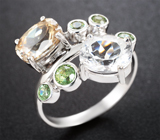 Кольцо с редким данбуритом 1,59 карата, чистейшими цирконами «шампань» и демантоидами гранатами 