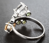 Кольцо с редким данбуритом 1,59 карата, чистейшими цирконами «шампань» и демантоидами гранатами 