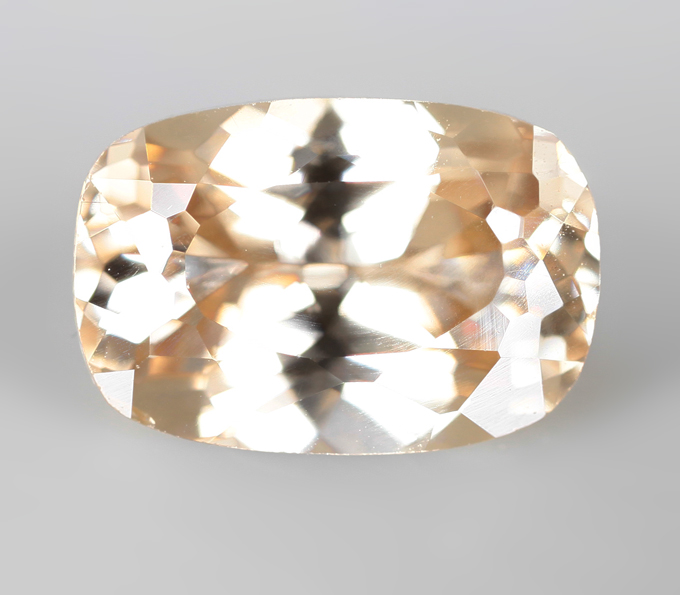 Кольцо с редким данбуритом 1,59 карата, чистейшими цирконами «шампань» и демантоидами гранатами 