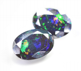 Крупная пара ограненных черных опалов 6,05 карата