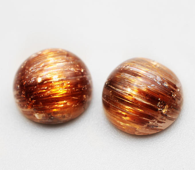 Парный кварц с золотистым рутилом с эффектом кошачьего глаза 4,71 карата