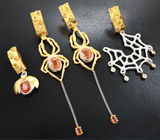 Комплект со спессартинами «фанта» 7,18 карата и разноцветными сапфирами