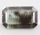 Коллекционный перидот с плотным включением рутила 4,89 карата