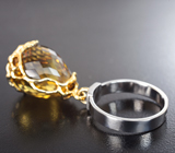 Кольцо с мобильно-закрепленным массивным бриолетом цитрина 22,82 карата