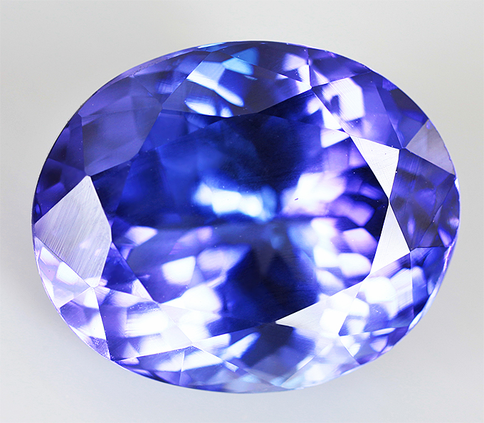 Кольцо с топовым танзанитом 6,46 карата, розовыми 3,92 карата и бесцветными муассанитами 0,6 карата