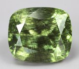 Коллекционный перидот с множественными включениями рутила 4,73 карата