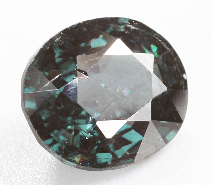 Редкая насыщенная синевато-зеленая шпинель 1,8 карата